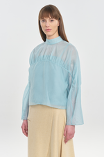 Light blue translucent silk blouse