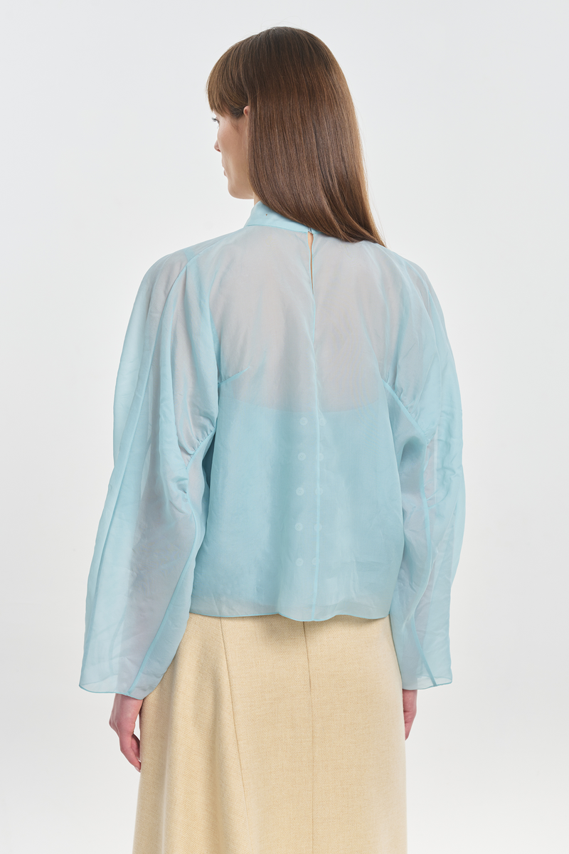 Light blue translucent silk blouse