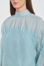 Light blue translucent silk blouse