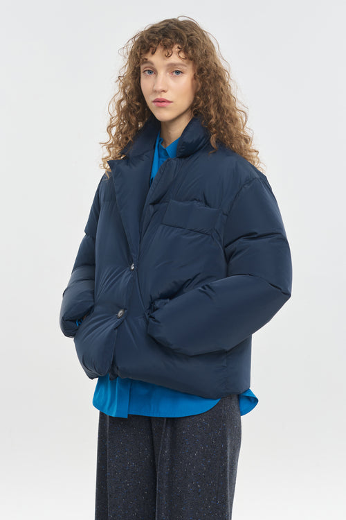 Dark blue softshell down puffer jacket