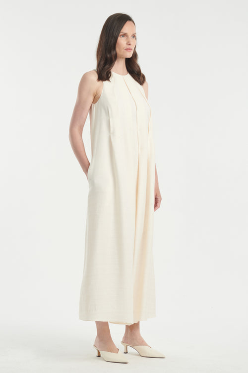 Light ivory sleeveless dress with pleats