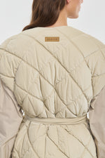 Light beige quilting & tech reversible vest