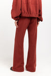 Dark brick technical wool jersey relaxed pants