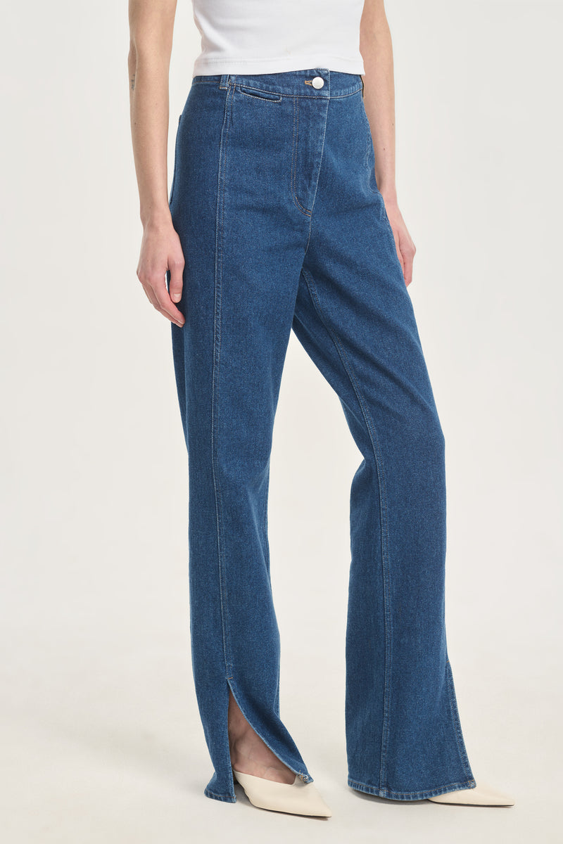 High waisted slim jeans with slit