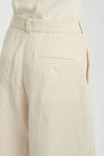 Ivory linen straight leg pants with pleats