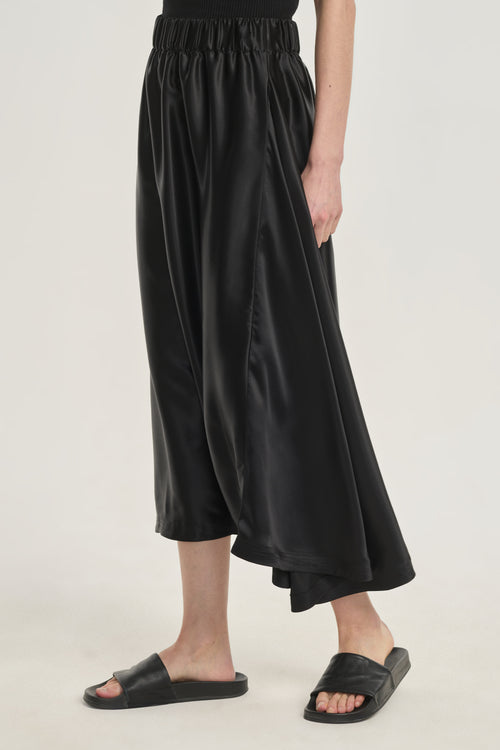Black satin fluid asymmetrical skirt