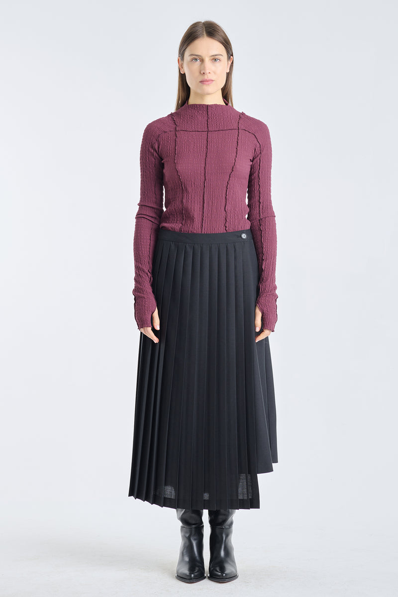 Black skirt with pleated panel