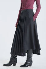 Black skirt with pleated panel