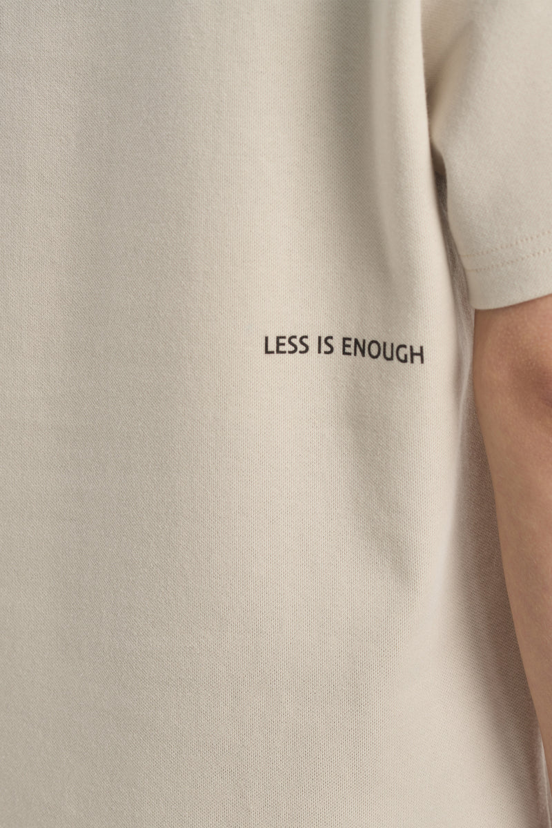 'LESS IS ENOUGH' natural vintage cotton boxy t-shirt