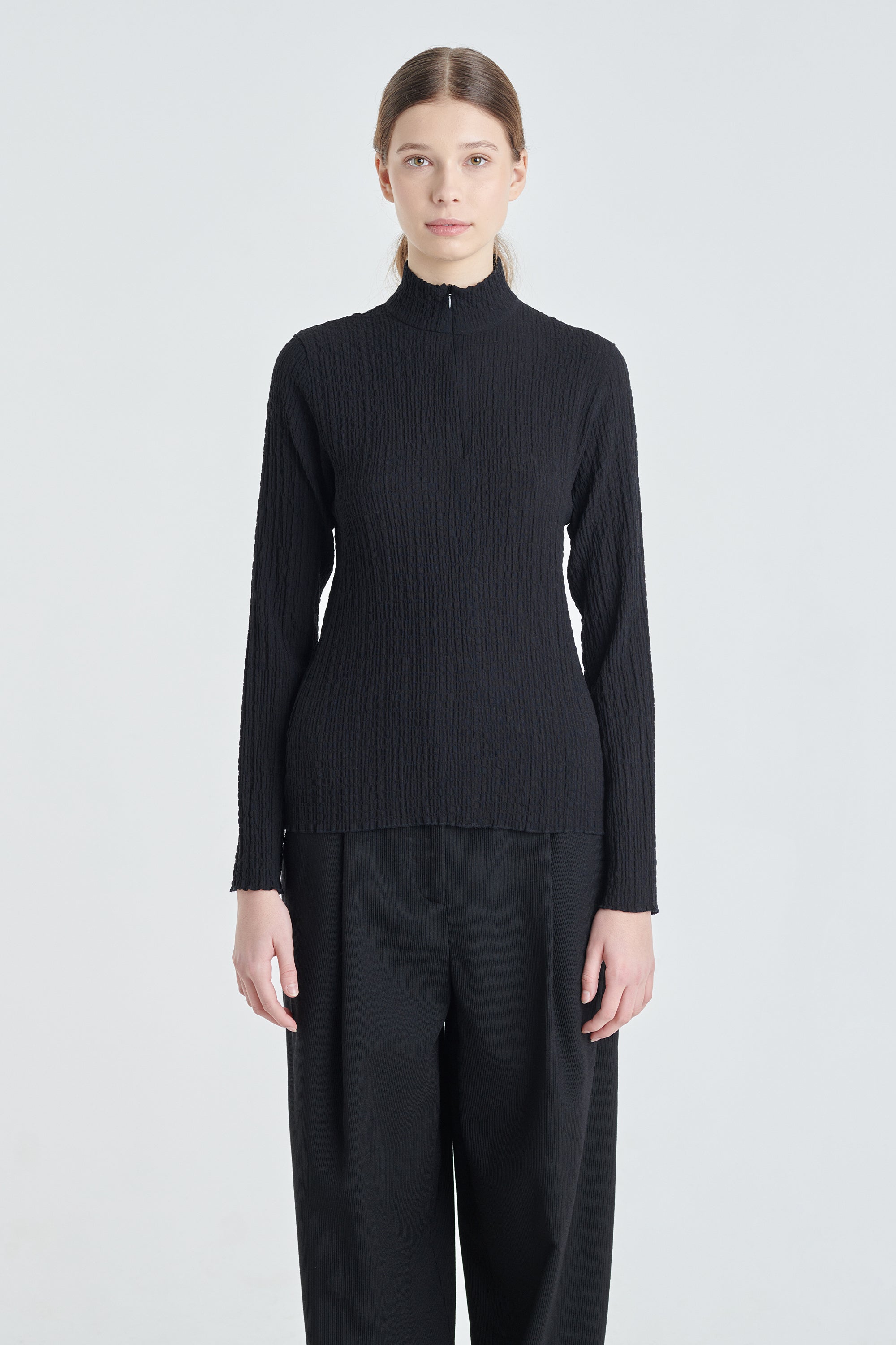 Black textured turtleneck with zipper – NEHERA