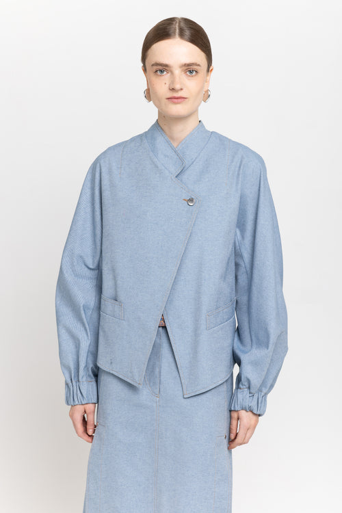 Light blue cotton denim asymmetrical bomber jacket