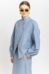 Light blue cotton denim asymmetrical bomber jacket