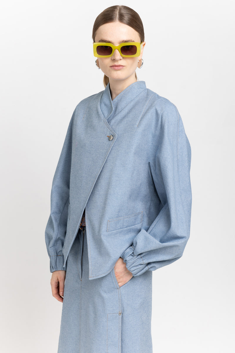 Light blue cotton denim asymmetrical bomber jacket