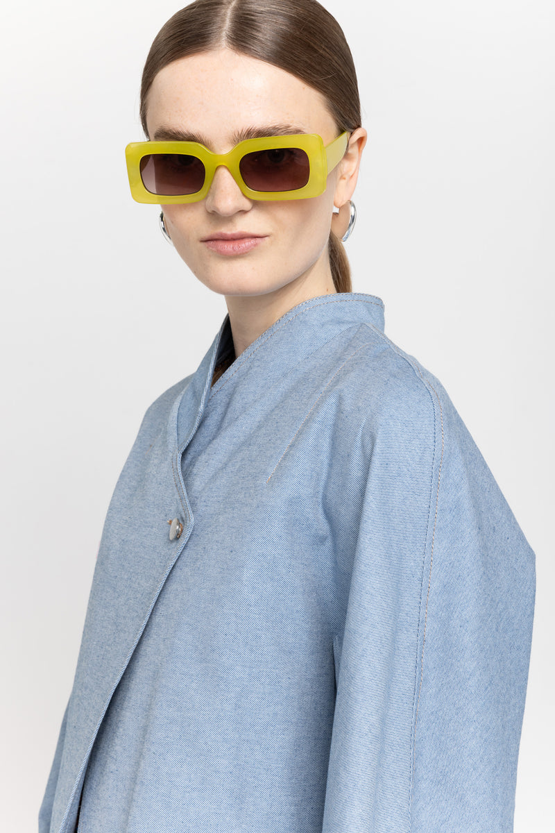 Light blue cotton denim asymmetrical bomber jacket