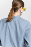 Light blue cotton denim asymmetrical bomber jacket