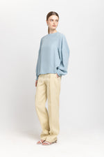 Light blue fluid lyocell blouse with shaped sleeves